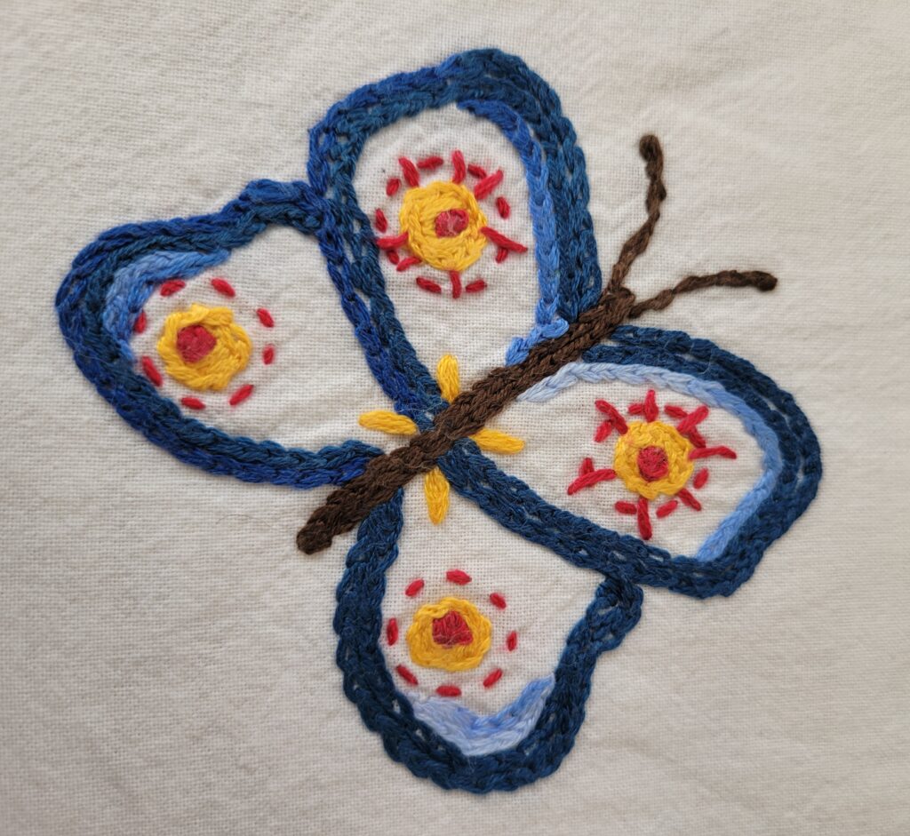Broderie- papillon de saison